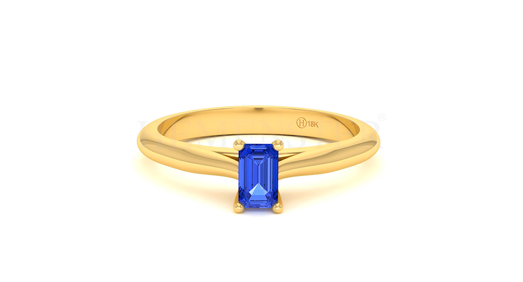 Anillo de oro con gemas de colores
