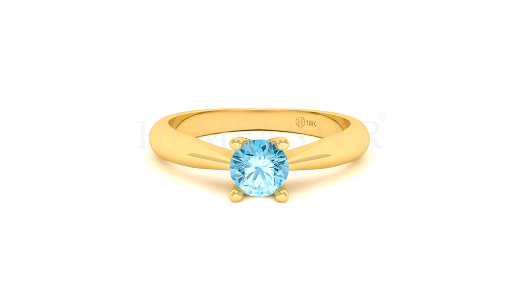 Anillo de oro con gemas de colores