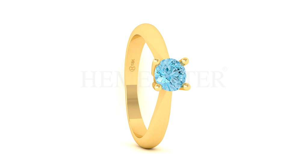 Anillo de oro con gemas de colores