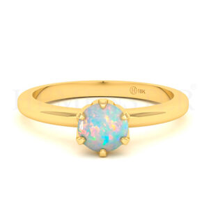 Anillo de oro con gemas de colores