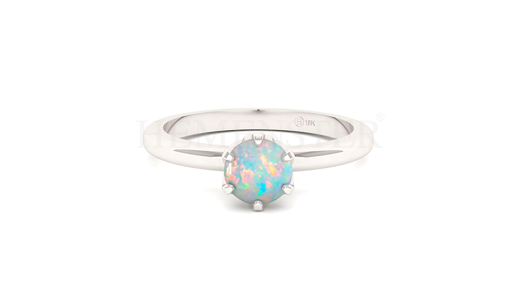 Anillo de oro con gemas de colores