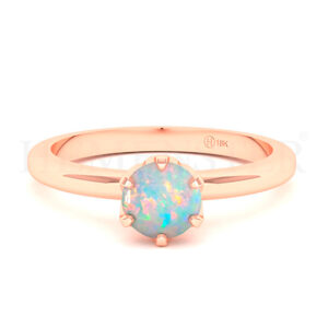 Anillo de oro con gemas de colores