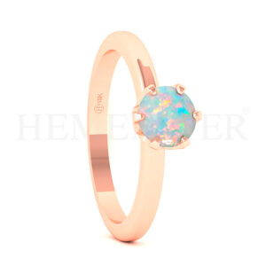 Anillo de oro con gemas de colores