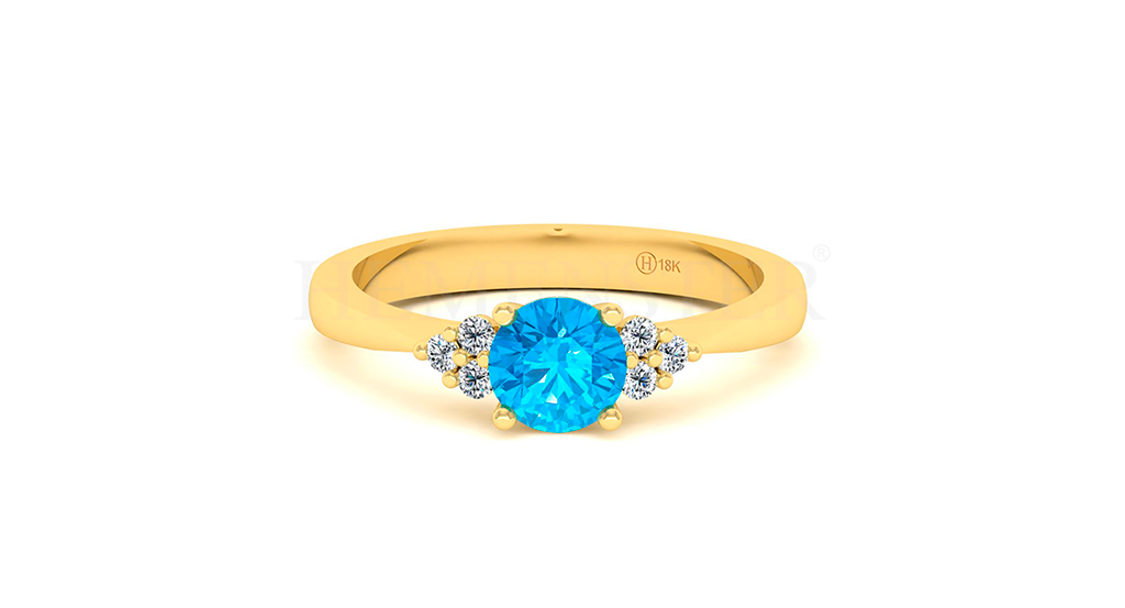 Anillo de oro con gemas de colores