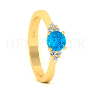 Anillo de oro con gemas de colores