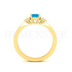 Anillo de oro con gemas de colores