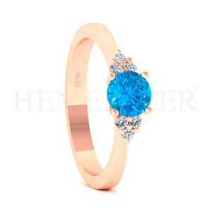 Anillo de oro con gemas de colores