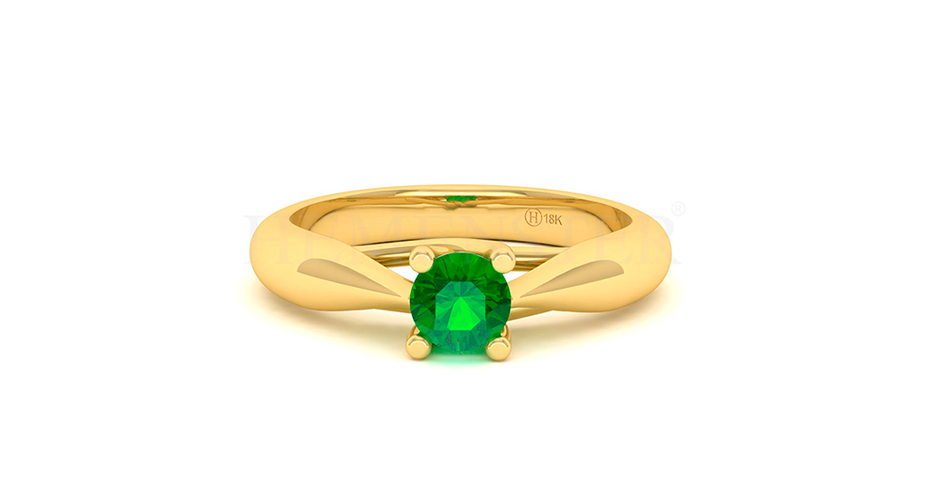 Anillo de oro con gemas de colores