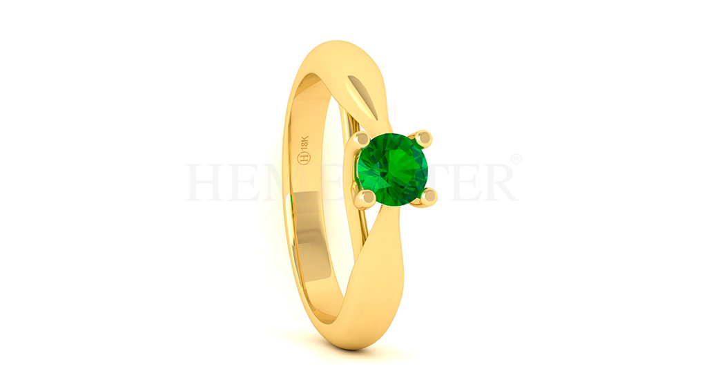 Anillo de oro con gemas de colores