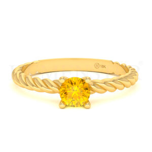 Anillo de oro con gemas de colores