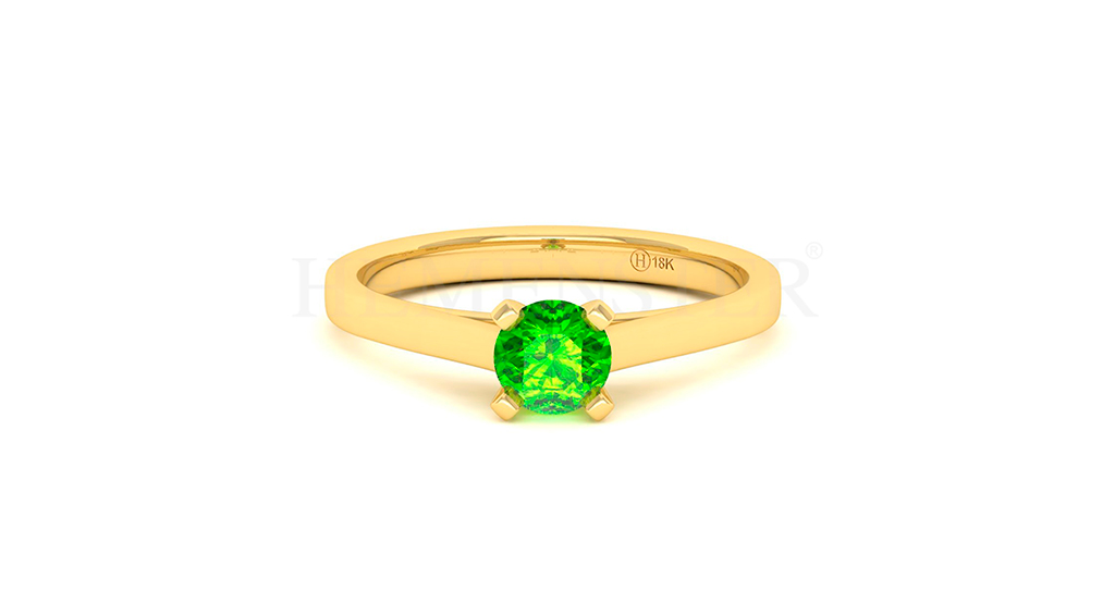 Anillo de oro con gemas de colores
